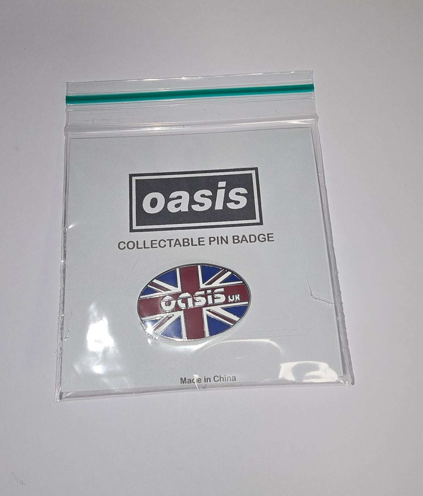 Oasis Pin Badge