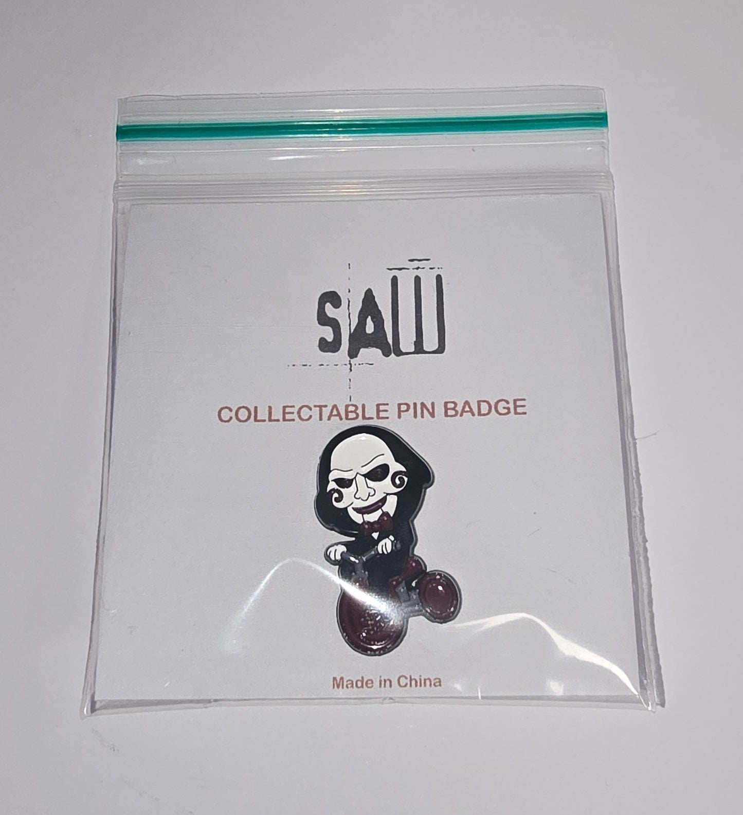 Saw Pin Badge